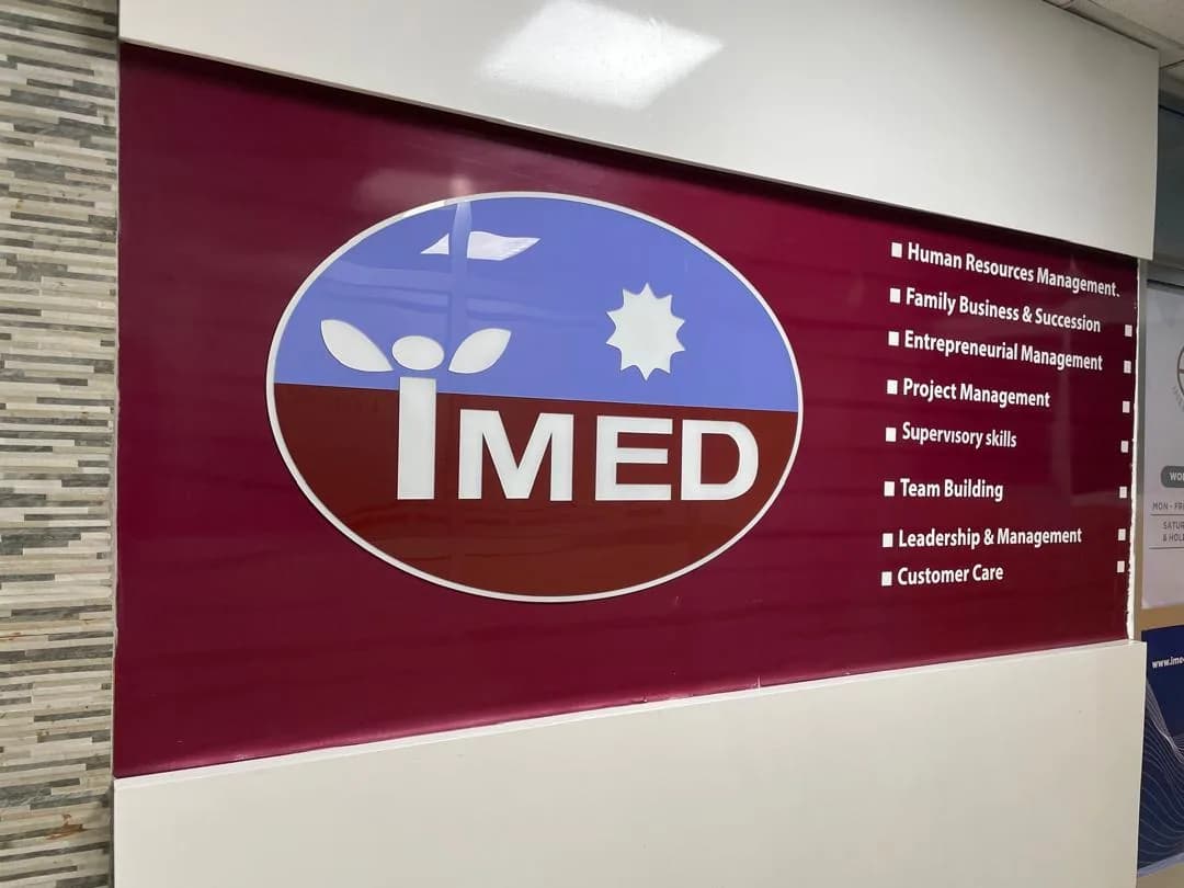 IMED brand wall in the HUB reception area